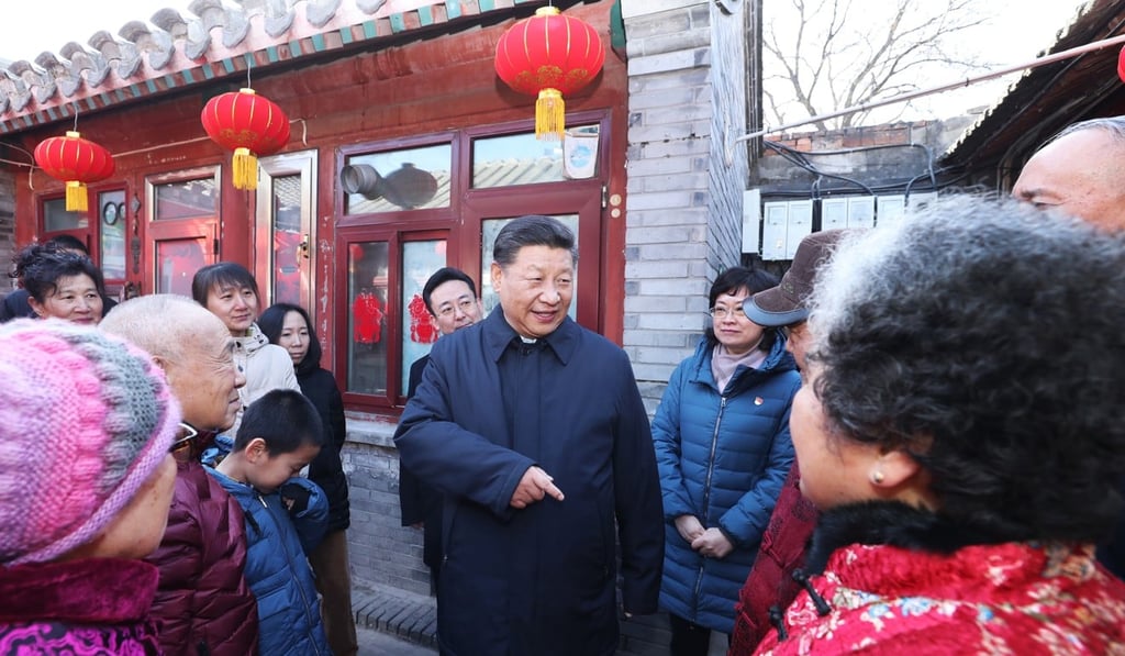 Chinese President Xi Jinping talks with residents of a hutong in Qianmen, central Beijing, on February 1, 2019. Photo: Xinhua