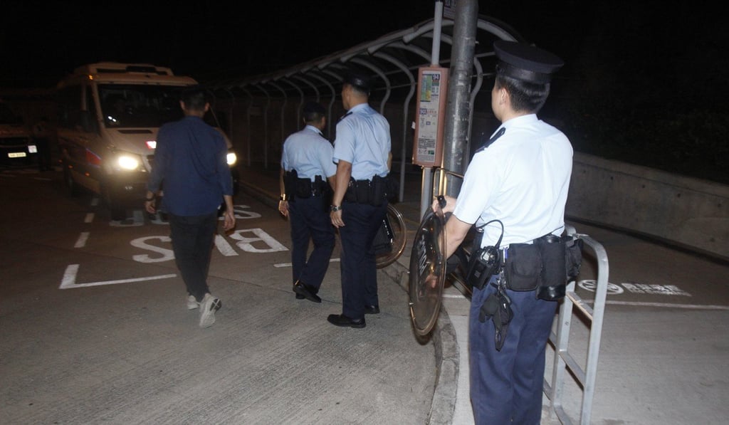 Police officers equipped with protective gear conducting a search. Photo: Handout