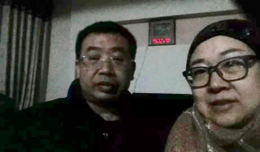 Jiang Tianyong with Wang Qiaoling, the wife of another human rights lawyer, after his release. Photo: Handout