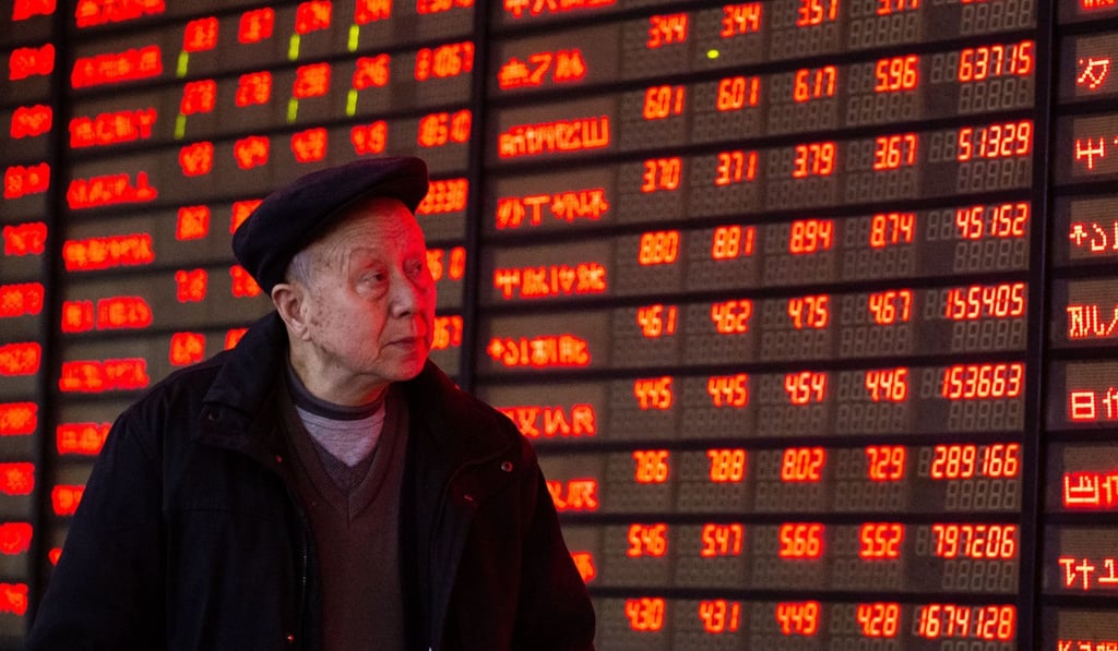 An investor eyes the results at a stock exchange in Nanjing on March 4, a day when Chinese shares closed higher following the MSCI's decision to increase the weight of China A-shares in its indexes. Photo: Xinhua