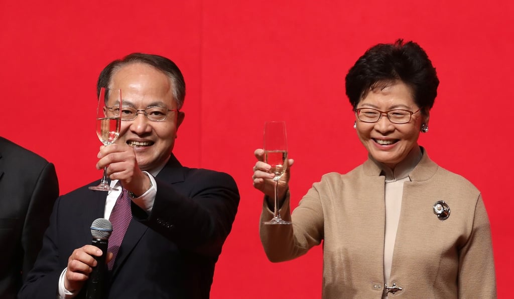 Wang Zhimin (left), the central government's liaison office chief in Hong Kong, and Chief Executive Carrie Lam at the Hong Kong Convention and Exhibition Centre in January 2019. Photo: Sam Tsang Wang Zhimin (left), the central government's liaison office chief in Hong Kong, and Chief Executive Carrie Lam at the Hong Kong Convention and Exhibition Centre in January 2019. Photo: Sam Tsang