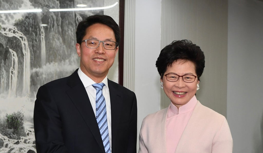 Zhang Xiaoming, director of the Hong Kong and Macau Affairs Office of the State Council, with Hong Kong Chief Executive Carrie Lam in Beijing in December. Photo: ISD