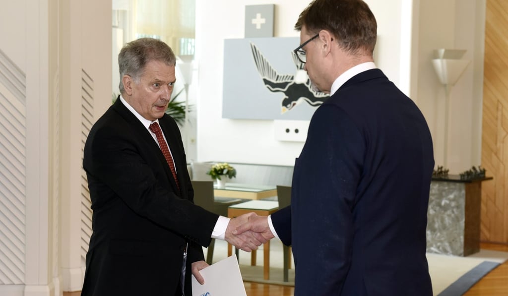 President of Finland Sauli Niinisto and Finnish Prime Minister Juha Sipila shake hands at the president’s official residence, Mantyniemi, in Helsinki on March 8, 2019. Photo: Reuters