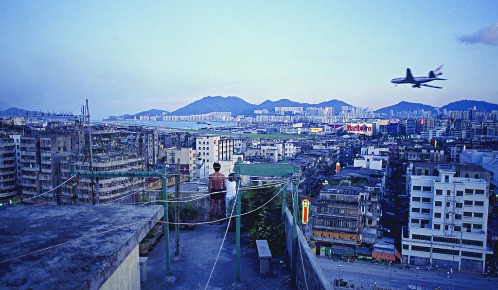 A passenger jet prepares to land at Kai Tak, Hong Kong’s former international airport, in Kowloon, located right in the heart of the city beside Victoria Harbour. Photos: Greg Girard; SCMP
