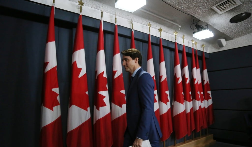 Justin Trudeau leaves a news conference on Thursday. Photo: AFP