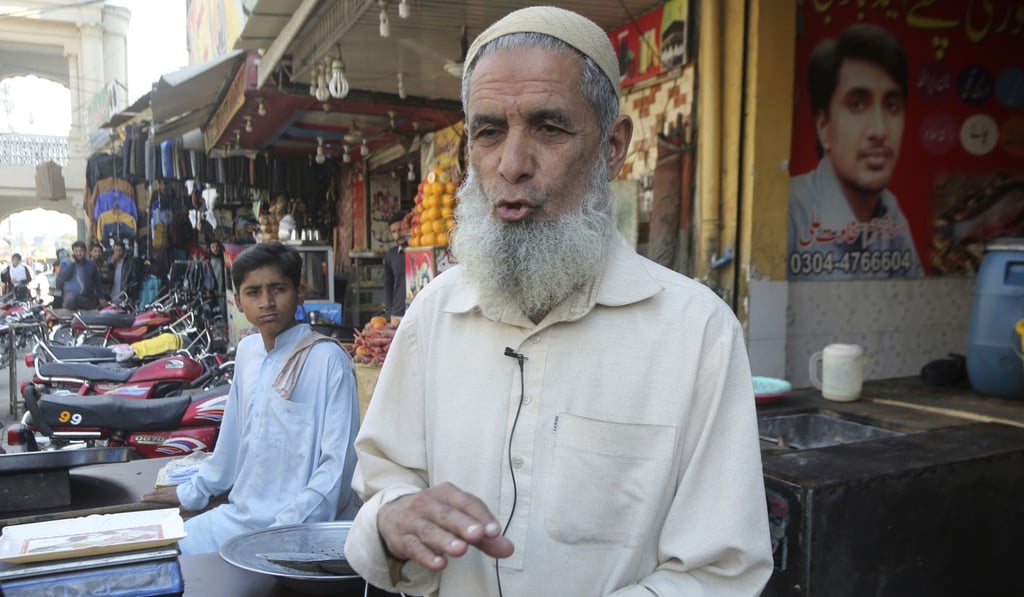 Pakistani shopkeeper Tahir Zia. Photo: AP