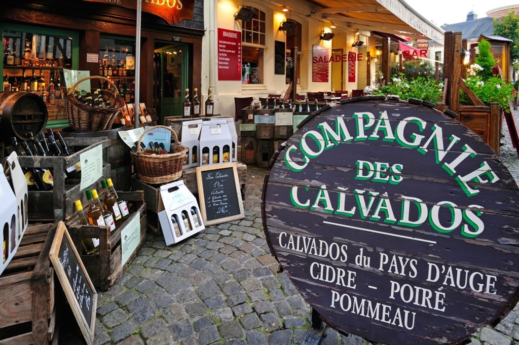A calvados shop in Honfleur, Normandy, France. Photo: Alamy A calvados shop in Honfleur, Normandy, France. Photo: Alamy