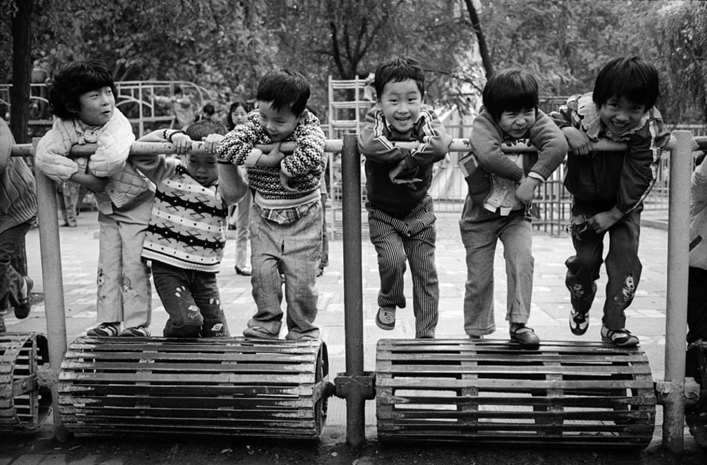 Children playing in Jing’an Park in Shanghai, 1985. Photo: Adrian Bradshaw