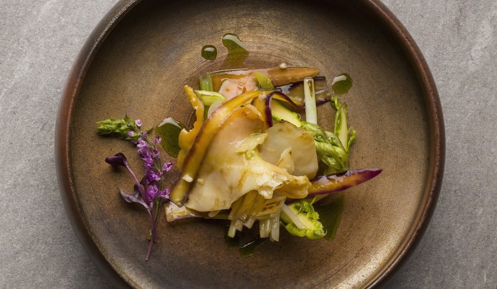Stir-fried sliced sea conch with seasonal root vegetables