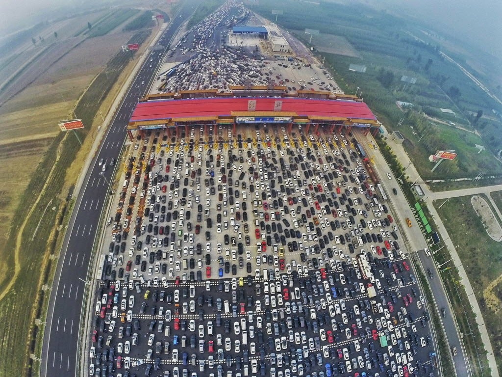 Vehicles in Beijing trying to merge as families return home during the end of Golden Week in 2015, a holiday around National Day in China. (Picture: China Daily)