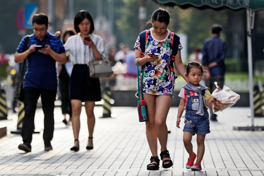 According to China’s Broadband Development Alliance, more than 85% of the population use mobile broadband. (Picture: AP Photo) According to China’s Broadband Development Alliance, more than 85% of the population use mobile broadband. (Picture: AP Photo)