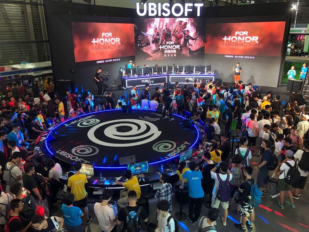 Ubisoft has an amphitheater set up inside their booth for gamers to compete on stage. Ubisoft has an amphitheater set up inside their booth for gamers to compete on stage.