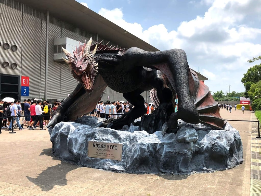 China is known for dragons, but this isn’t an Asian dragon: It’s Drogon from Game of Thrones, hanging out to promote Tencent and Yoozoo’s mobile game based on the show. (We think, despite his size, Drogon is still just a teenager here. Yikes.) China is known for dragons, but this isn’t an Asian dragon: It’s Drogon from Game of Thrones, hanging out to promote Tencent and Yoozoo’s mobile game based on the show. (We think, despite his size, Drogon is still just a teenager here. Yikes.)