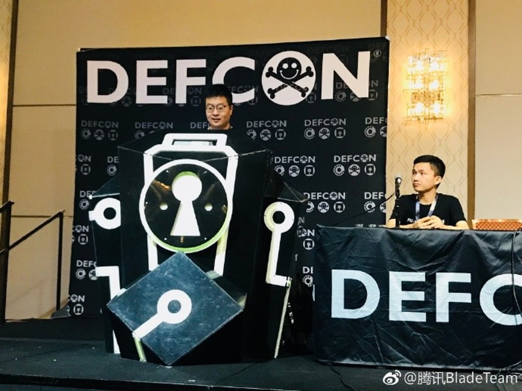Researchers Wu Huiyu and Qian Wenxiang presenting their research at DefCon. (Picture: Tencent Blade Team) Researchers Wu Huiyu and Qian Wenxiang presenting their research at DefCon. (Picture: Tencent Blade Team)