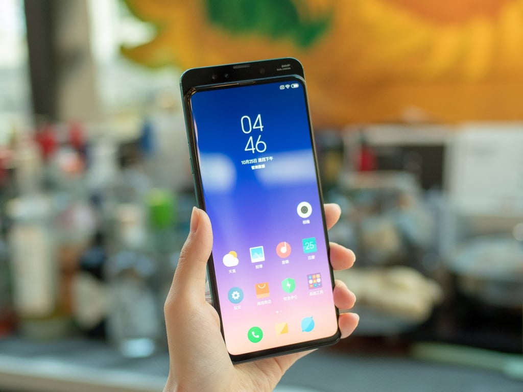 Slide the screen downward to reveal the selfie cameras. Slide the screen downward to reveal the selfie cameras.