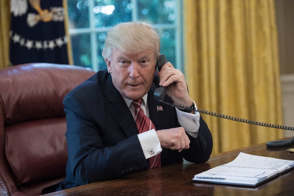 President Trump using the White House landline in June, 2017. (Picture: AFP Photo) President Trump using the White House landline in June, 2017. (Picture: AFP Photo)
