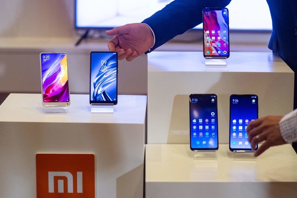 Xiaomi products displayed at its IPO press conference in Hong Kong. (Picture: AFP)