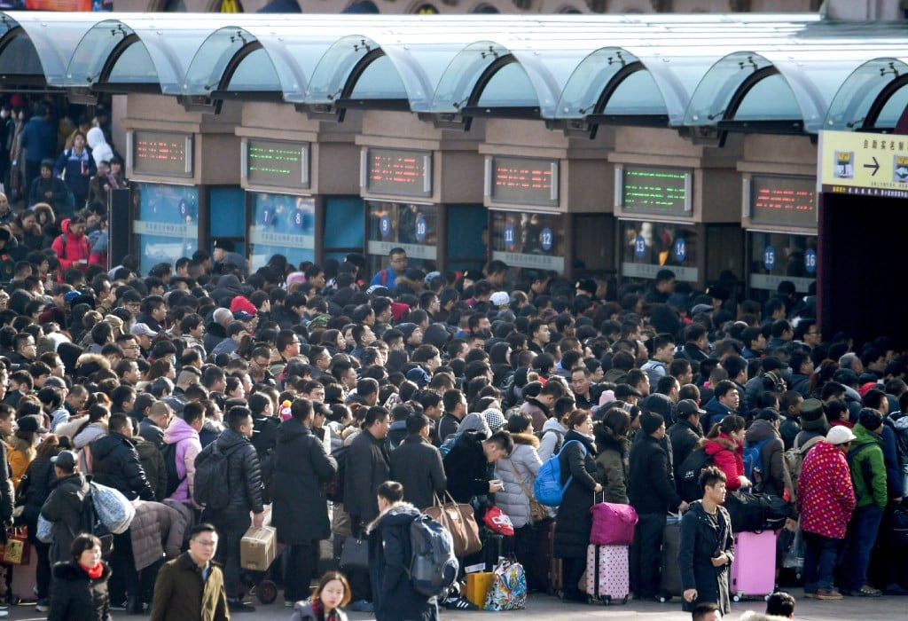 Crowds gather at a train station in Beijing -- one of the few places in China where electronic boarding is available -- two weeks before Lunar New Year 2018. Imagine what it was like elsewhere in the country. (Picture: Kyodo)