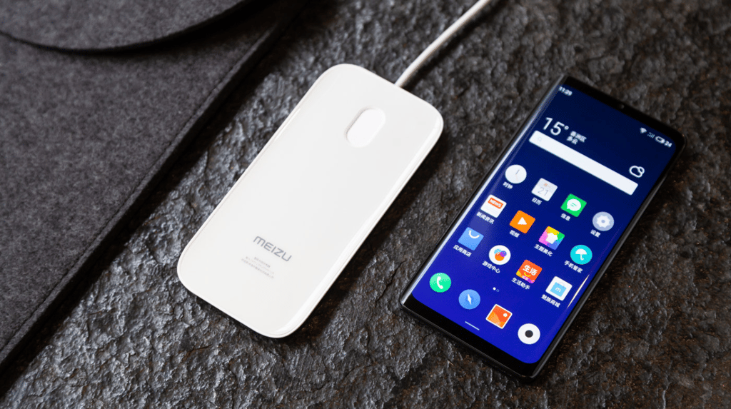 Meizu calls this the world’s first holeless phone (right). (Picture: Meizu via Weibo)