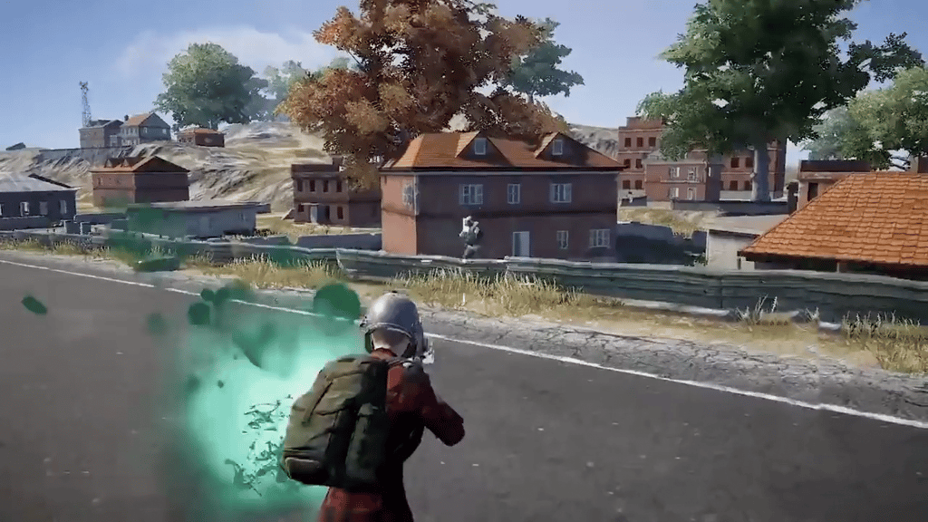 A game character being shot in China’s version of PUBG, with a puff of green signifying A game character being shot in China’s version of PUBG, with a puff of green signifying
