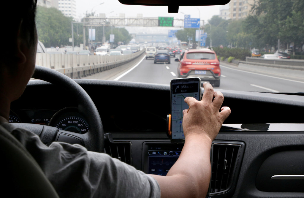A Didi driver in Beijing. (Picture: Jason Lee/Reuters) A Didi driver in Beijing. (Picture: Jason Lee/Reuters)