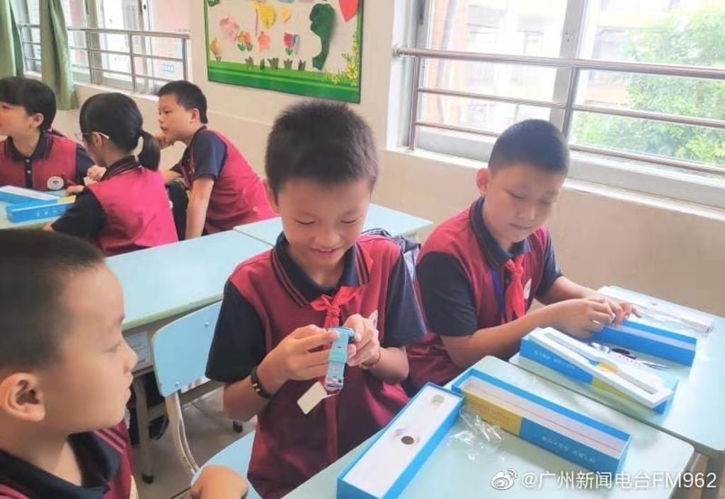 In 10 years, he probably won’t look as thrilled about the idea of constant surveillance. (Picture: Guangzhou News Radio FM962 via Weibo) In 10 years, he probably won’t look as thrilled about the idea of constant surveillance. (Picture: Guangzhou News Radio FM962 via Weibo)