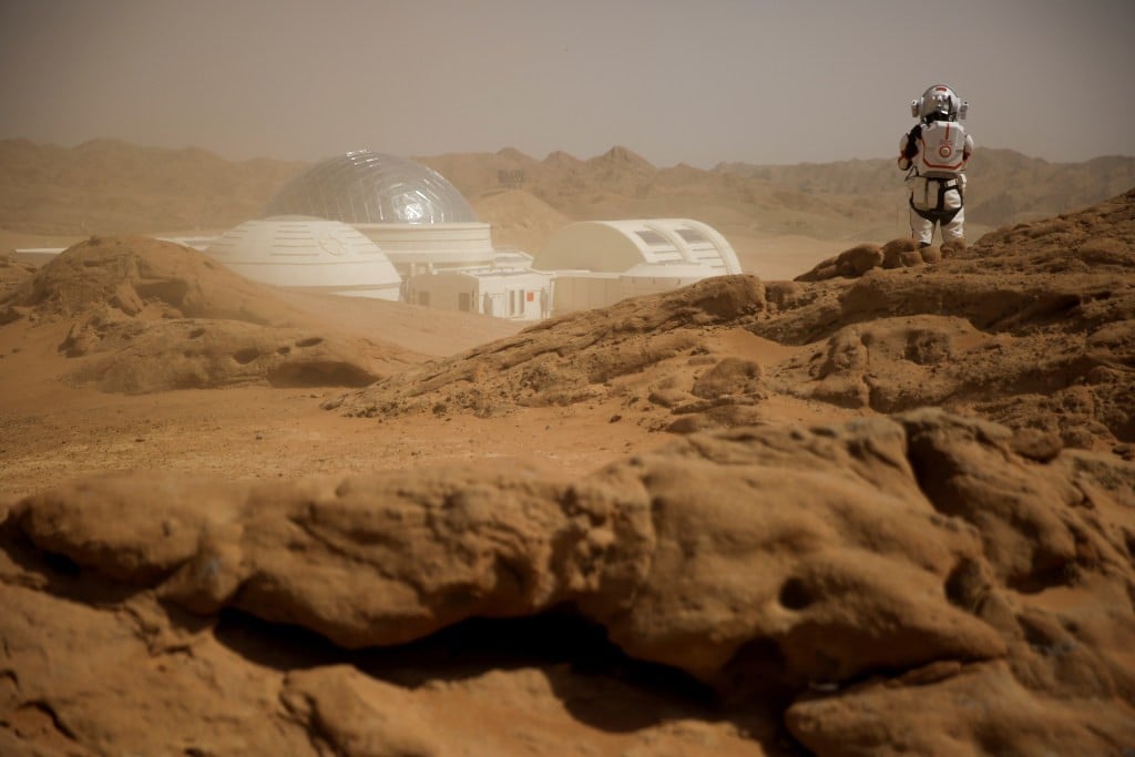 At the C-Space Project Mars simulation base in China’s Gobi Desert, a staff member poses in a mock space suit in April 2019. (Picture: Reuters) At the C-Space Project Mars simulation base in China’s Gobi Desert, a staff member poses in a mock space suit in April 2019. (Picture: Reuters)