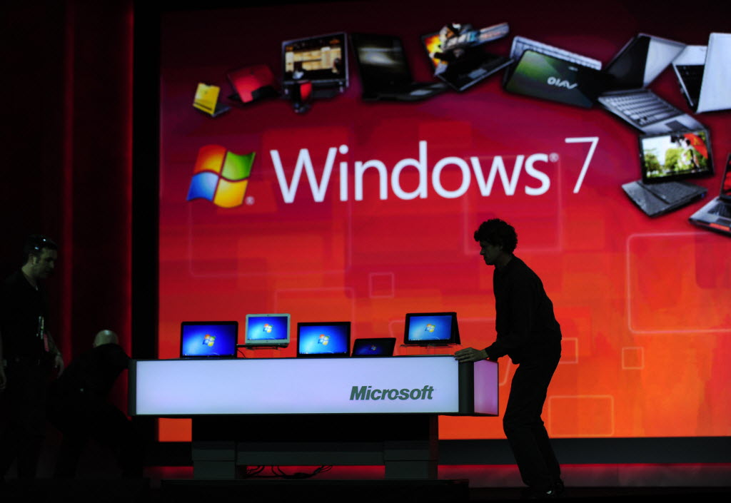 Laptop computers on display during a keynote speech by then-Microsoft CEO Steve Ballmer at CES 2011. (Picture: Robyn Beck/AFP)