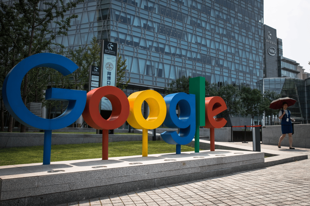 A woman walks near the Google office in Beijing on August 3, 2018. (Picture: Roman Pilipey/EPA-EFE)