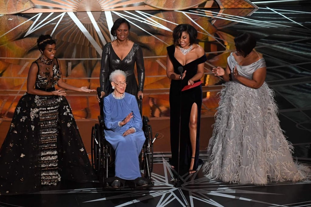 Katherine Johnson surrounded by actresses Janelle Monae, Taraji P. Henson and Octavia Spencer on stage at the 89th Oscars in 2017. (Picture: Mark Ralston/AFP Photo)