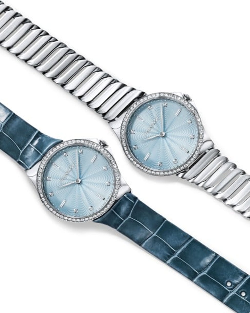 Tiffany Metro 2-Hand 28mm watch in stainless steel with diamonds comes in with leather strap and stainless steel bracelet.