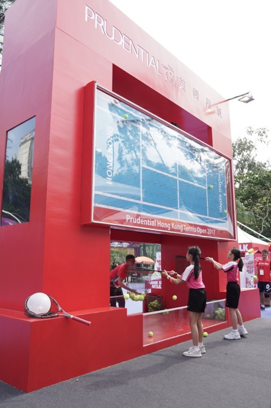 Young fans try their hand at a ball game.