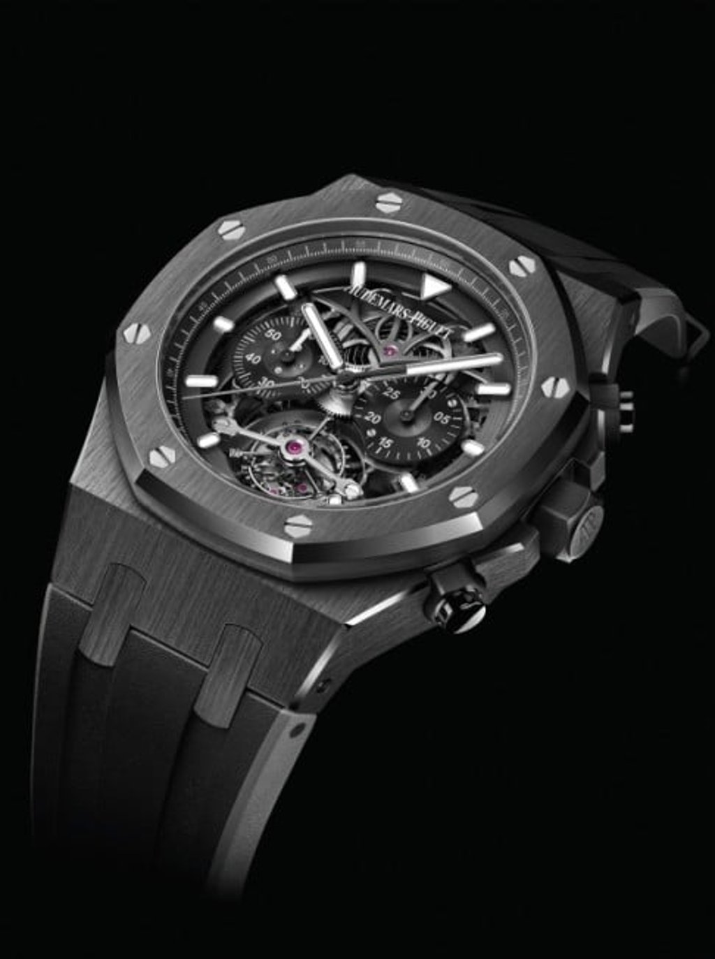 Exchange the black ceramic bracelet with a two-tone black rubber strap with subtle grey highlights for a more casual look.