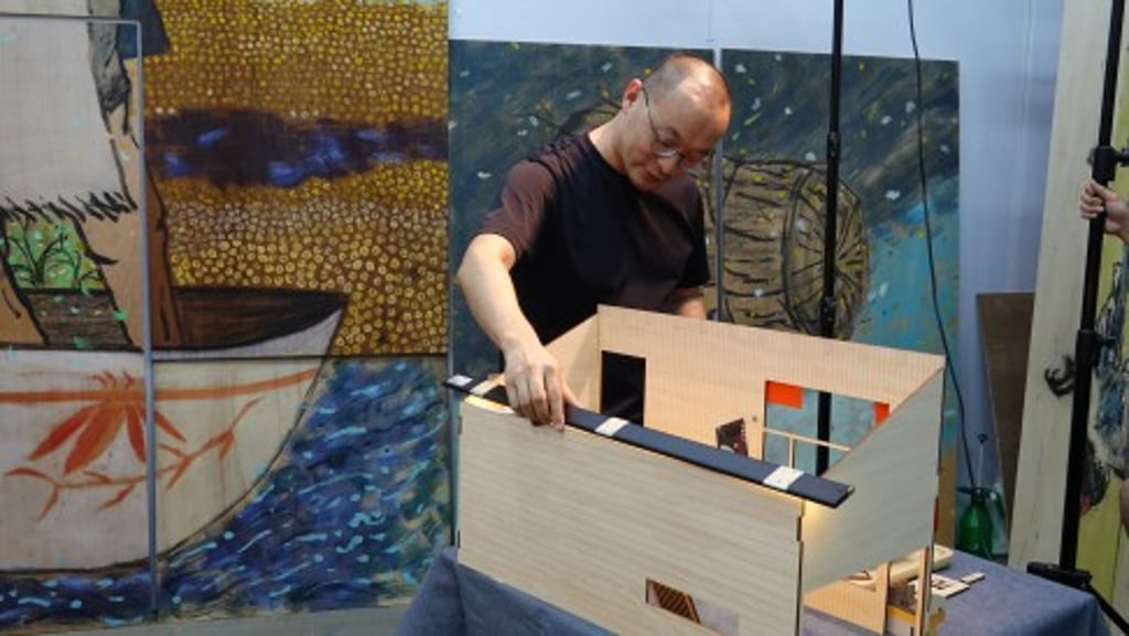 To prepare for the exhibition, Lam Tung-pang created a wooden miniature Hong Kong House to develop his ideas and visualised the artworks in his studio as an exhibition setting.