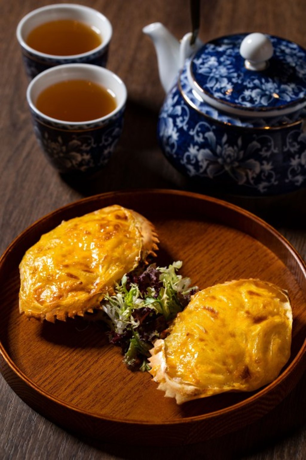 Baked conpoy with crab meat features on the signature menu at Forum.