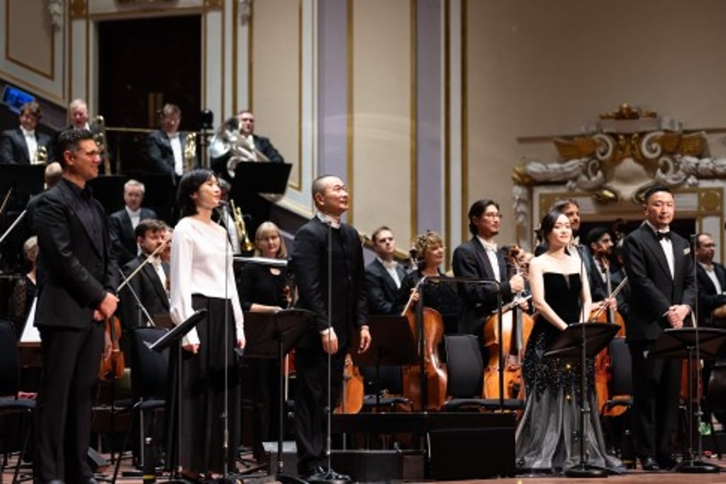 Curtain call at the Edinburgh International Festival, Samantha Chong (second from left), maestro Tan Dun (third from left), Louise Kwong (second from right), and Chen Chen (right).