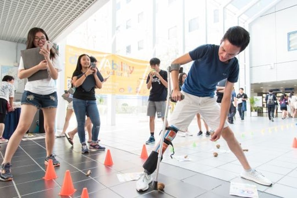 Students experience hardship faced by the mobility challenged in the SEN DiversAbility Week. Students experience hardship faced by the mobility challenged in the SEN DiversAbility Week.