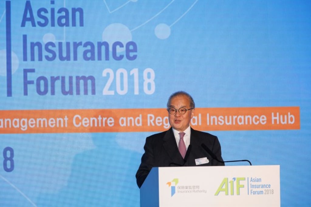 Dr Moses Cheng, Chairman of the Insurance Authority, delivers his welcome remarks