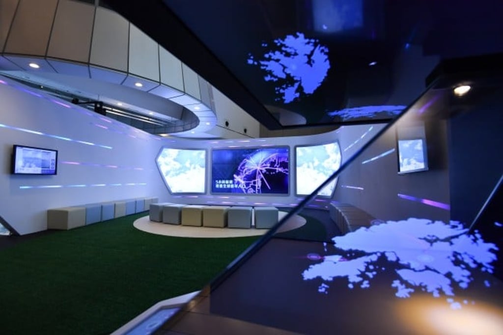 Giving a visual peek into the future are a hologram (front) and a naked-eye 3D video display (back). Giving a visual peek into the future are a hologram (front) and a naked-eye 3D video display (back).