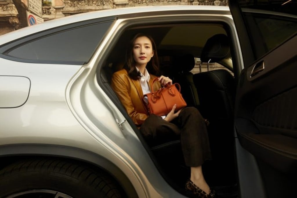Maggie Jiang steps out with a D-Styling in orange smooth leather.