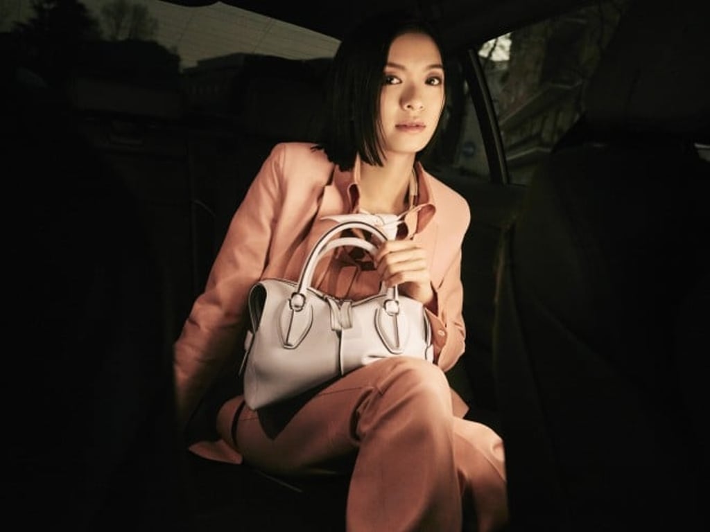 Nana Eikura with her D-Styling in white smooth leather.