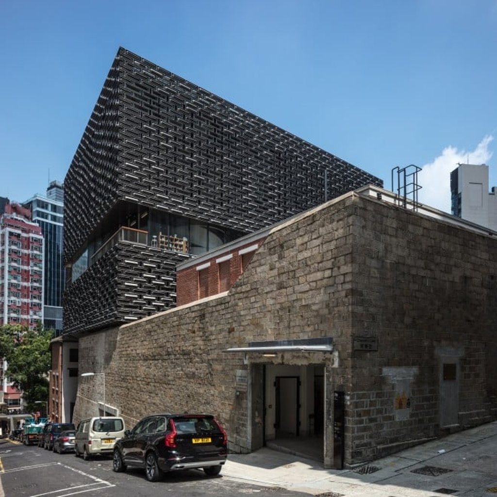 Facades of the new buildings were made from discarded alloy wheels, blending a contemporary aesthetic with original brickwork. (Photo credit: Edmon Leong)