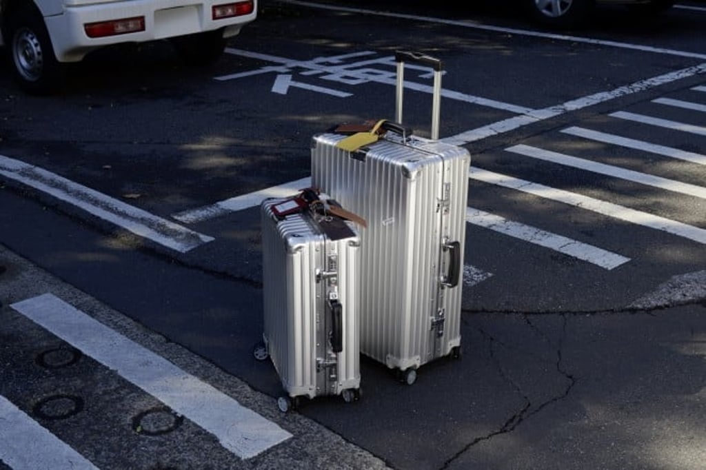 Kim Jones always travel with his RIMOWA Classic suitcases made from high-end anodised aluminium.