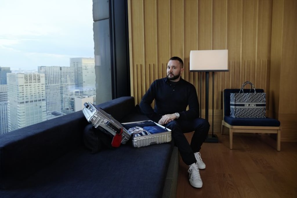 Kim Jones masters the art of packing with his RIMOWA suitcase.
