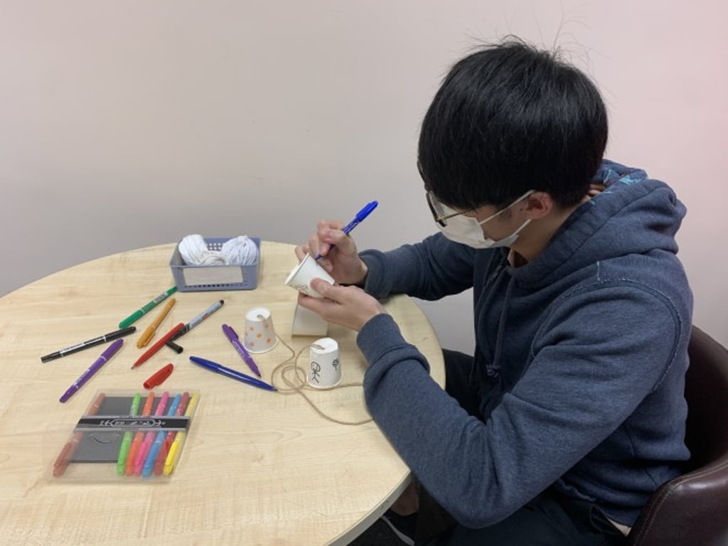 Student volunteers prepare bilingual experiment kits for children from low-income families to relieve their boredom at home and learn science in a fun way during the pandemic.