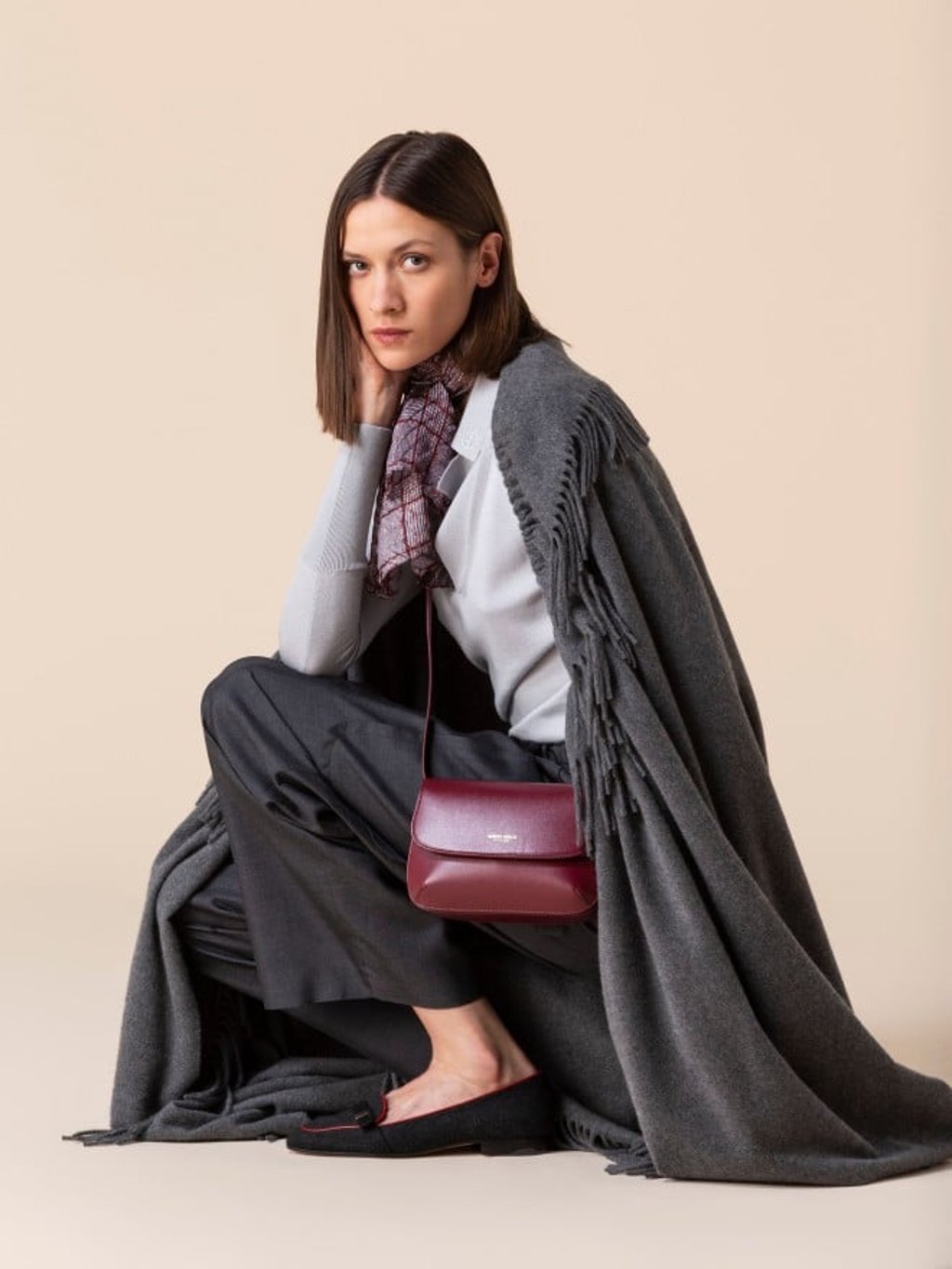 The La Prima bag is the perfect accessory for the Giorgio Armani New Normal collection.