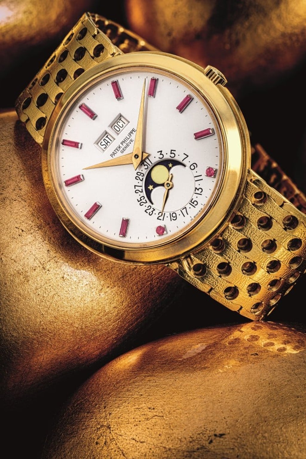 Patek Philippe self-winding perpetual calendar bracelet watch with baguette rubies as hour markers, ref. 3448/8.