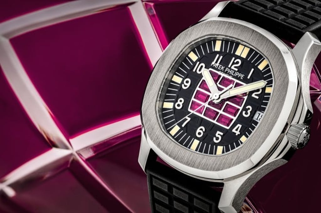 Patek Philippe white gold bespoke Aquanaut set with 12 baguette-shaped rubies, ref. 5063.