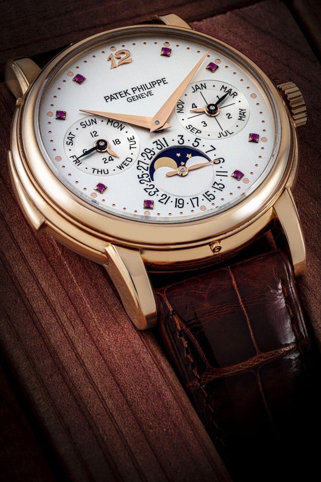 Patek Philippe 18K Pink Gold automatic minute repeater with ruby-set numerals, ref. 3974R.