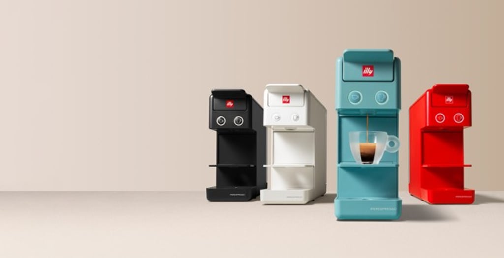 The compact Y3.2 Iperespresso capsule machine is a must-have for coffee lovers. The compact Y3.2 Iperespresso capsule machine is a must-have for coffee lovers.